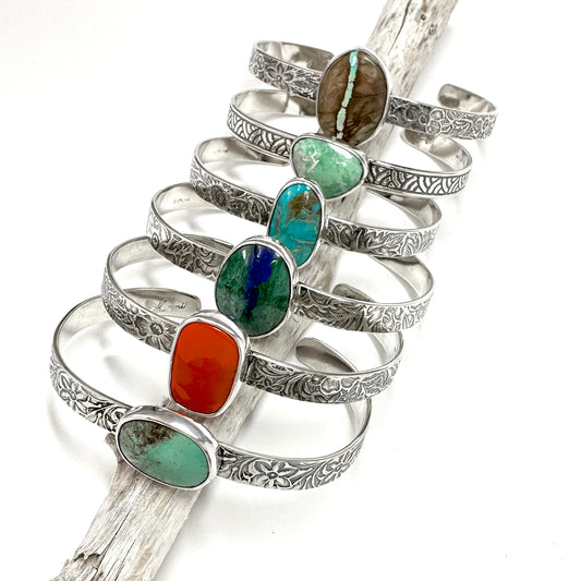 vintage flower patterned cuff bracelets with turquoise, rosarita gold slag, azurite malachite, variscite and Royston ribbon turquoise in 1/4 inch wide sterling silver, artist handmade silver jewelry by Hanni jewelry harbor springs Michigan pure Michigan made
